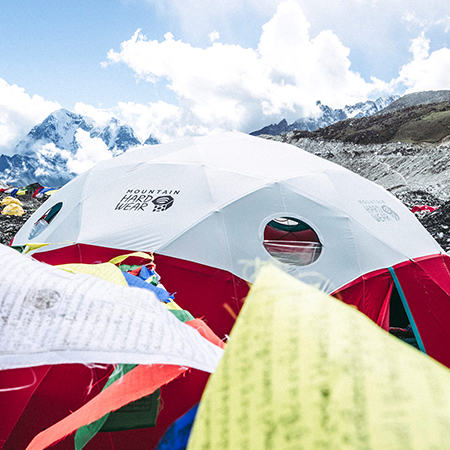 View of Everest Base Camp with a MHW Space Station Tent front and center, Everest in the background.