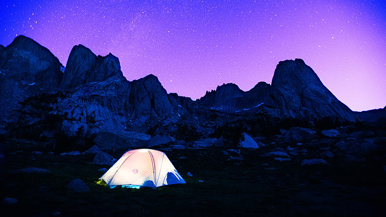 View of the Mineral King Tent in the high alpine under a very starry night.