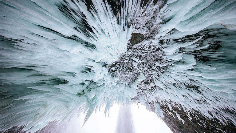 Looking up at a lot of ice in the wilderness 
