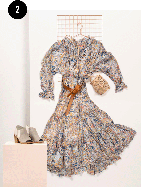 A floral dress outfit styled by Kate with SOREL Nadia ankle booties