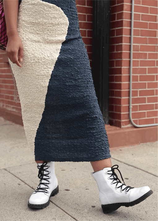 Marjon Carlos wearing Lennox Lace booties in an urban setting