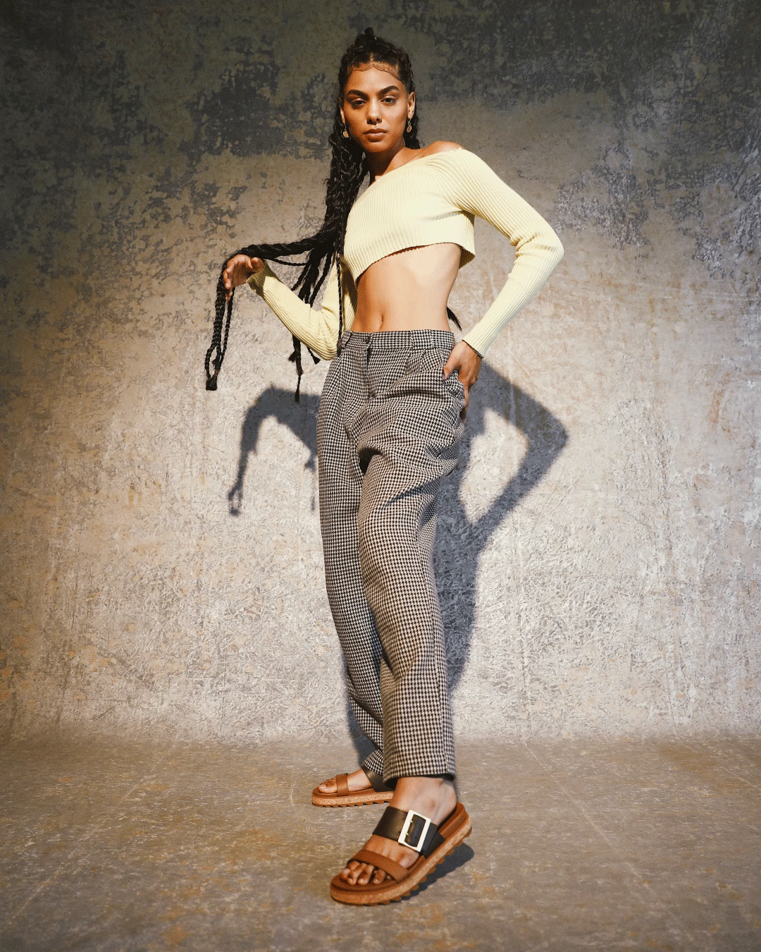 Monique Jones wearing Roaming Buckle Slide sandals