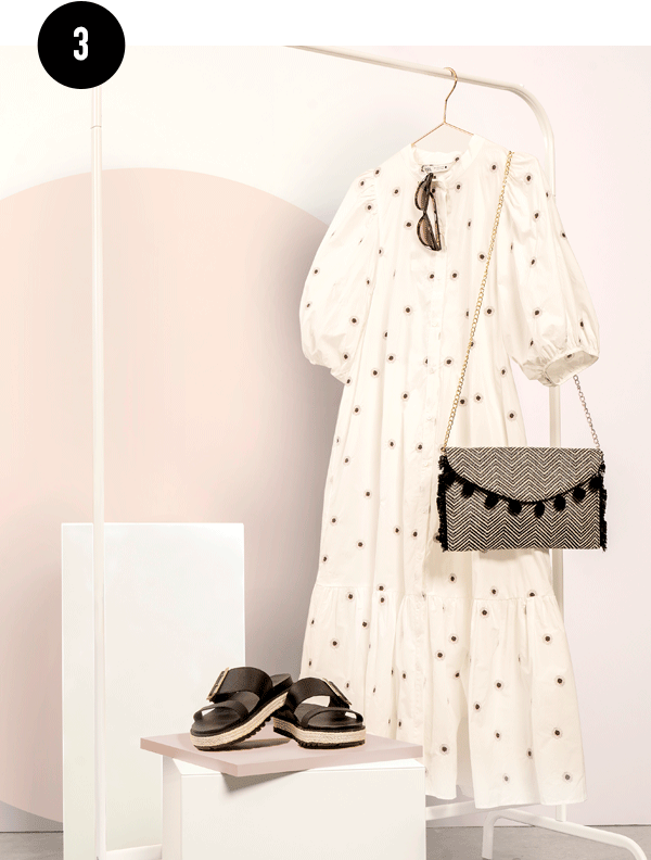 An oversized dress outfit styled by Kate with SOREL Roaming Buckle Jute sandals