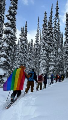 Open Mountains friends skin their way through the backcountry on skis. 