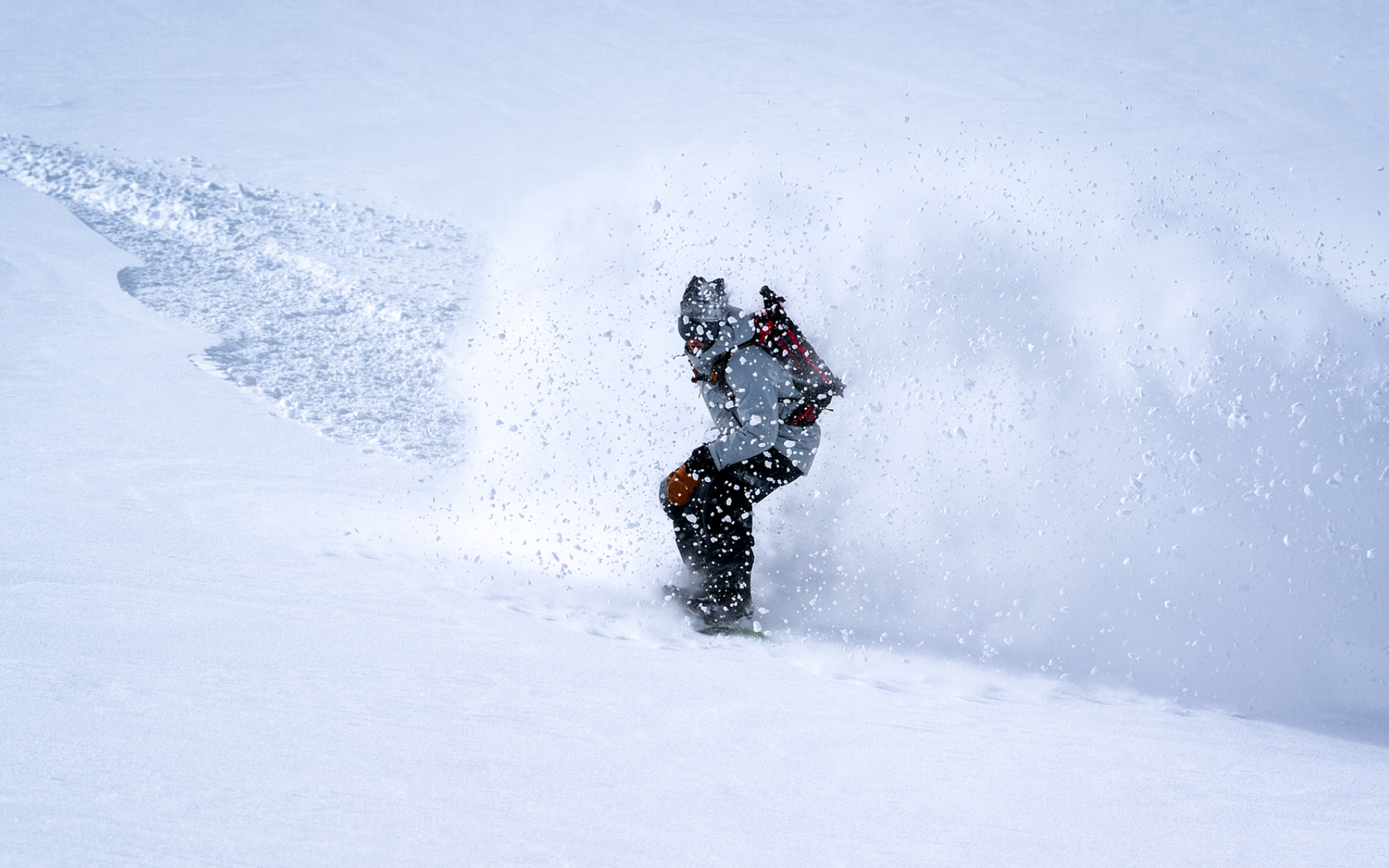Bruce Johnston snowboarding in prime snow globe conditions.