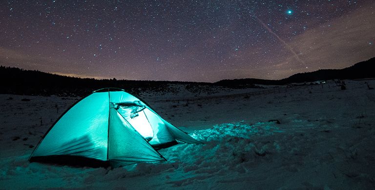 Planning a cold-weather camping trip? Check out these tips to maximize your winter excursion