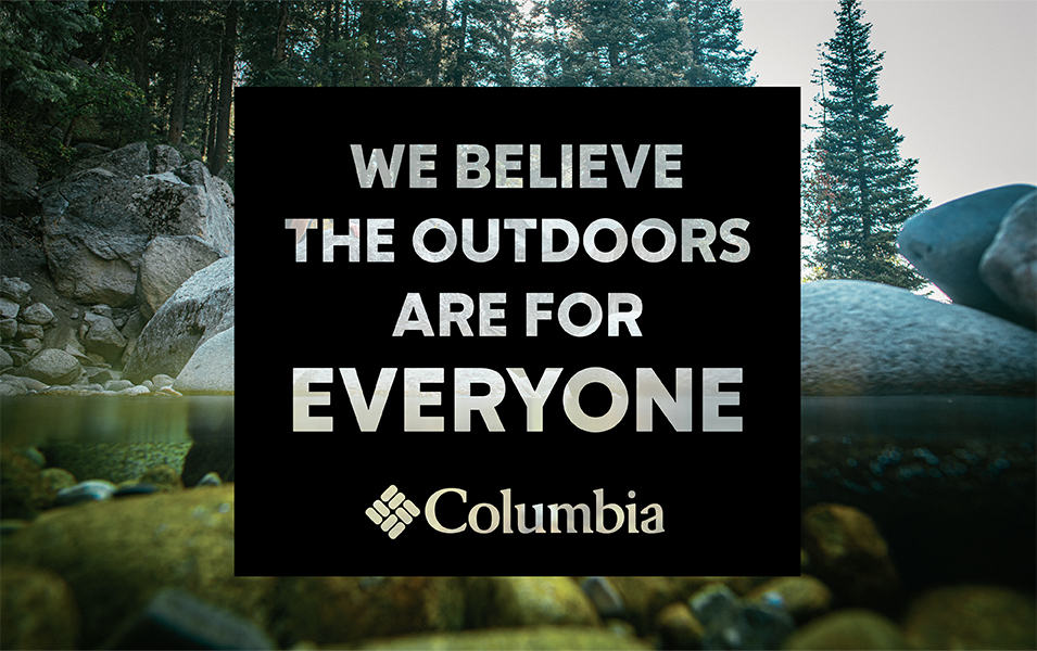 A photo of a mossy green body of water containing large gray rocks sits behind a black square inset containing the words “We Believe The Outdoors Are For Everyone—Columbia.”