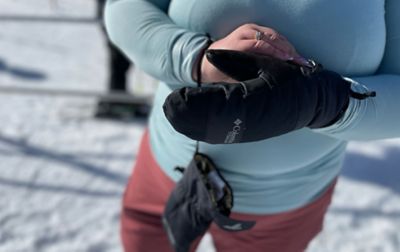A close-up shot of a pair of black Columbia Sportswear mittens. 