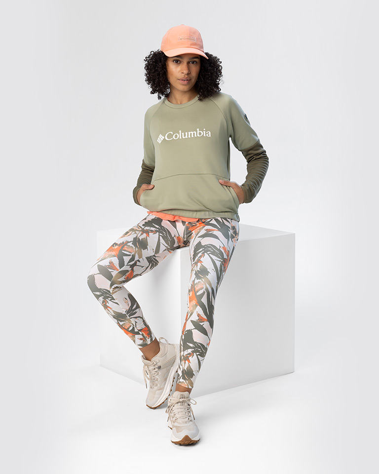 Outfit 6, a green and peachy pink look with cap, sweatshirt, and floral leggings.