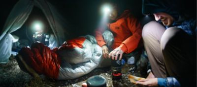 Cozy in sleeping bags while camping.