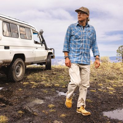 A man after packing up his car for adventure