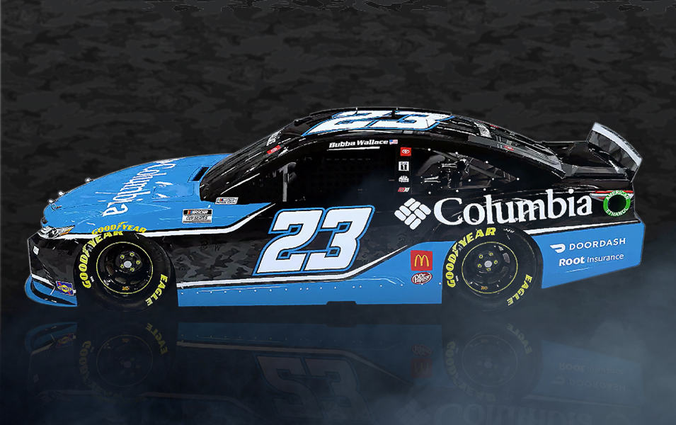 Image of Bubba Wallace's 23 car on a dark background. 