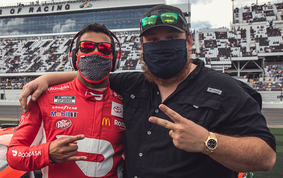 Bubba Wallace and Luke Combs at a Nascar race. 