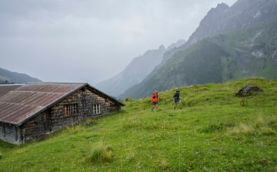 Matt and Lauren running in the rain.