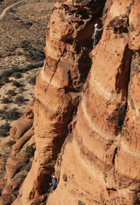 Tiny humans, big landscape, two climbers explore a multi-pitch route in the Utah desert