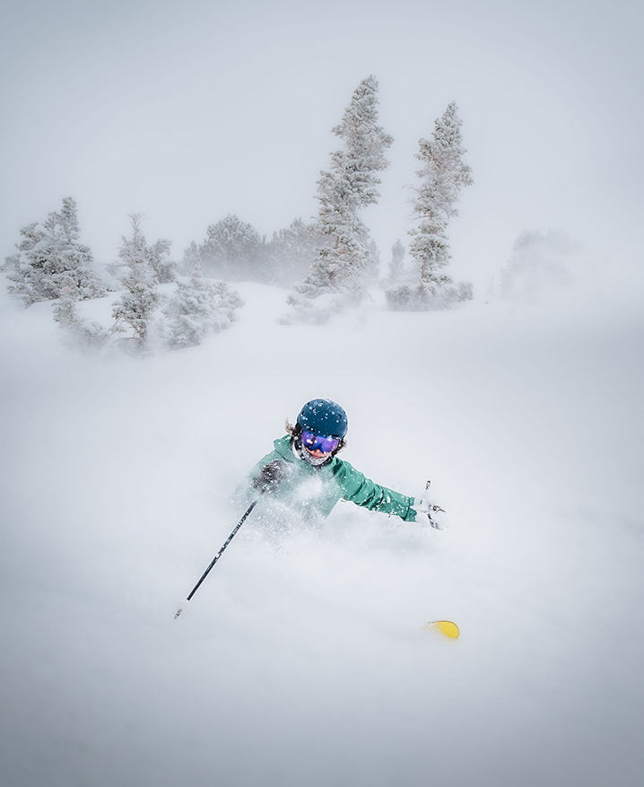 Happiest in deep powder, Rachel skies in white out conditions