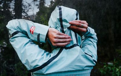 Person playing with hood closure. 