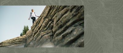 Woman hiking in Columbia gear.