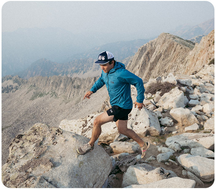 profile of Ted Hesser running in the Kor Airshell in the high country