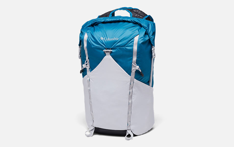 A product image of a blue-and-white Columbia Sportswear Tandem Trail 22-liter backpack set against a white background. 