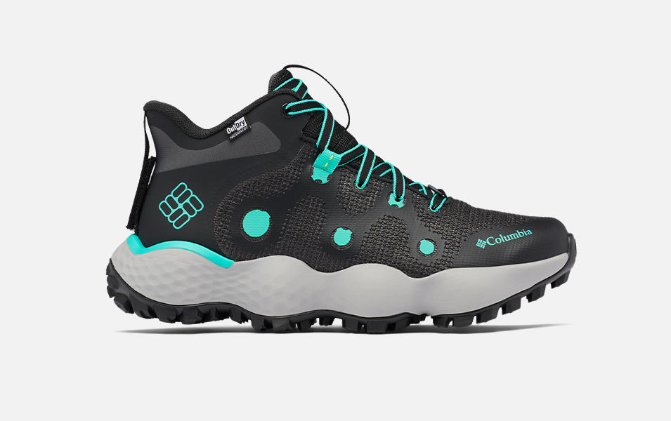 A product image of a black-and-aqua-blue Columbia Sportswear Escape Thrive multi-sport shoe set against a white background. 