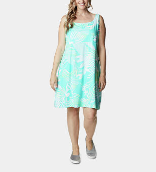 Plus size woman in a dolphin stencil hibiscus print dress.