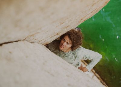 Bouldering high above water.