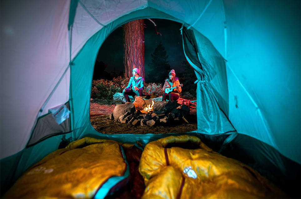 Infrared image of Miranda Oakley and her climbing partner sitting by a campfire, while on a camping trip in the Needles.
