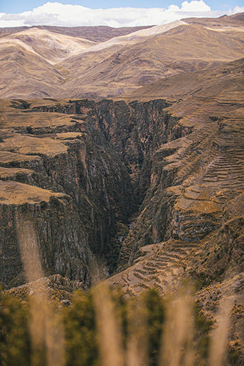 A distant view of a valley in Chacco Huayllascca in Peru. Research online called this area, “Pitumarca,” but we learned through the locals that this valley was the “Hachojo sector.” 