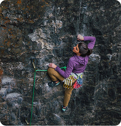 During 2021 Open Aperture photo clinic, Shara reaches for her next hold while lead climbing