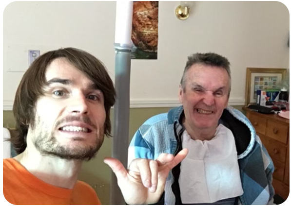 Ethan takes a selfie with his dad