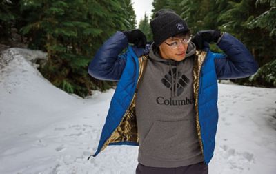 An outdoorsman adjusts the lining on his Omni-Heat Infinity winter jacket. 
