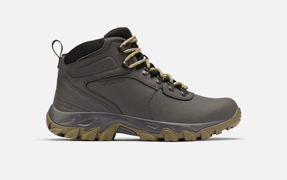 A product shot of Columbia Sportswear’s Newton Ridge Plus II waterproof hiking boot set against a white background. 