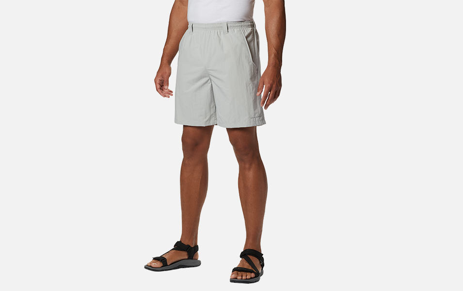 A product shot of Columbia Sportswear’s Men's PFG Backcast III water shorts set against a white background. 