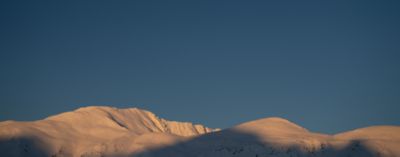 Snowy mountain landscape.