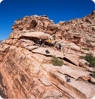 participants from the 2022 AMGA LGBTQIA2S+ SPI Course on the rock during the course