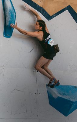 Kyra reaching for next hold