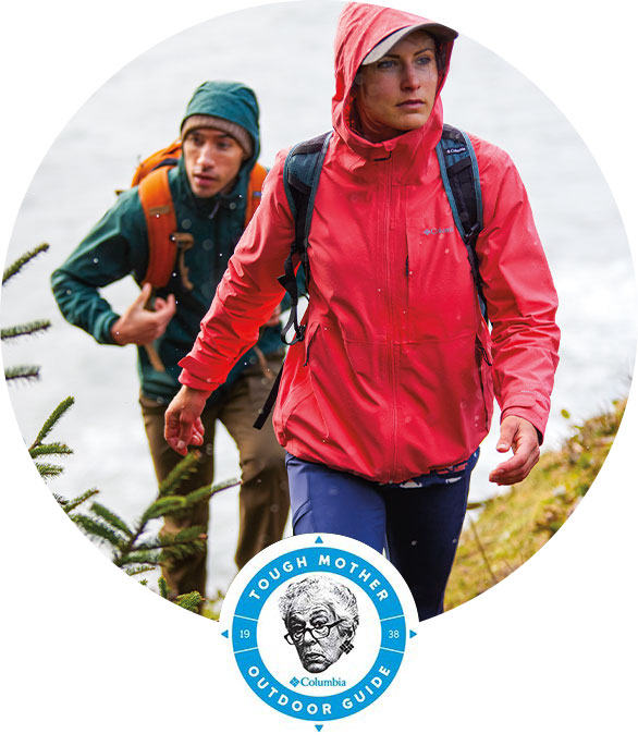 A crew of hikers on the trail, the leader with a prosthetic leg. Tough Mother Outdoor Guide logo. 