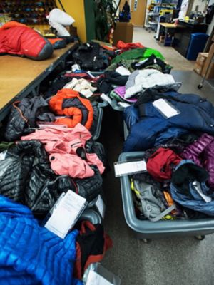 A look into the repair process at MHW HQ- bins full of sent in product, in the queue ready to be repaired.