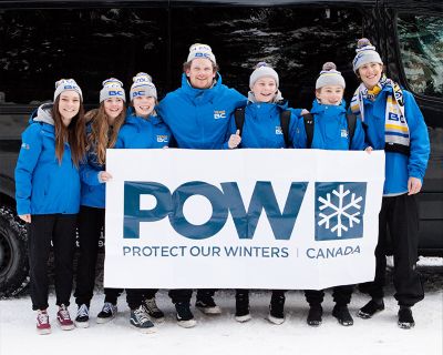 Group of young people holding a POW Canada sign