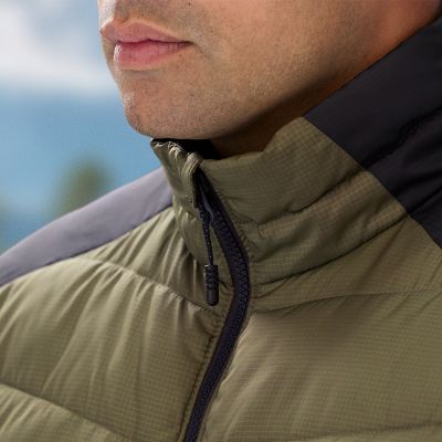 Jacket fully zipped up, showing off the protective chin guard.
