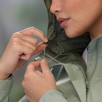 Close-up of a person adjusting the hood for the perfect fit.