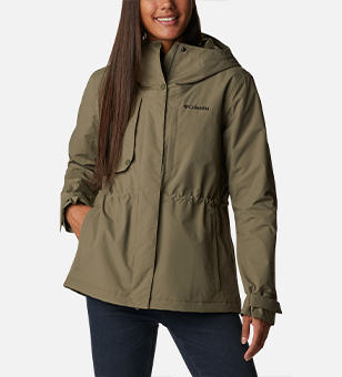 Woman in an olive green Columbia rain jacket.