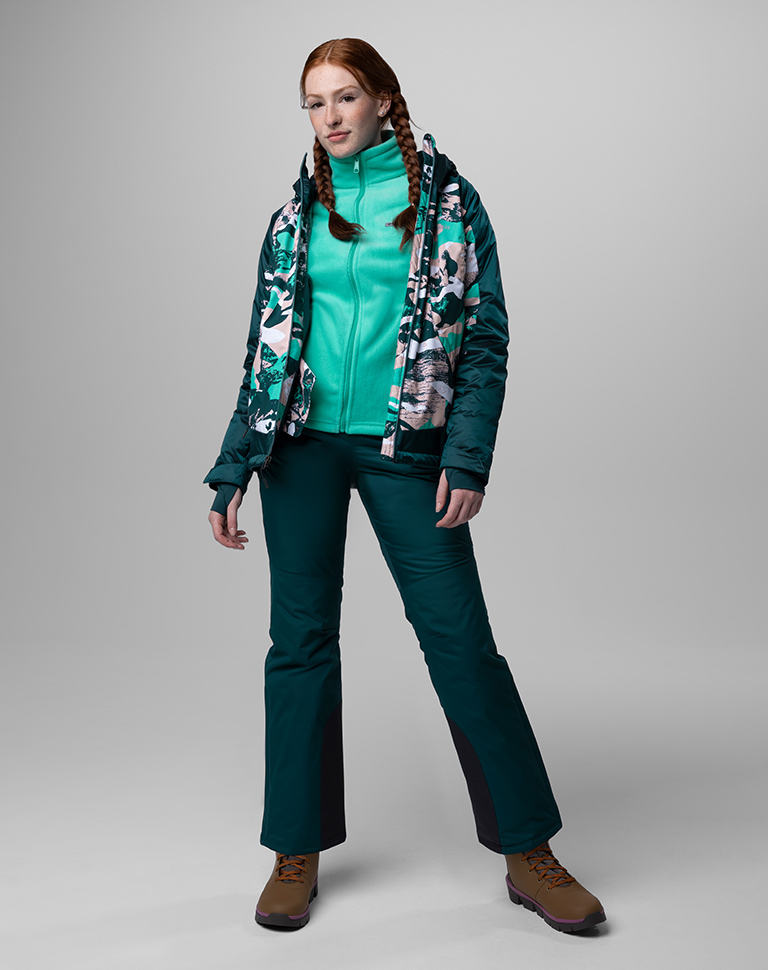 Outfit 1: High-contrast patterned Interchange jacket with puffer, coral snow pants.