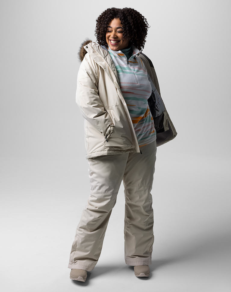 Outfit 1: High-contrast patterned Interchange jacket with puffer, coral snow pants.