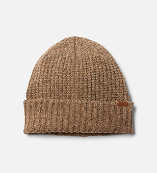 A tan knit beanie hat.
