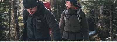 close up of two hikers wearing Stretchdown jackets