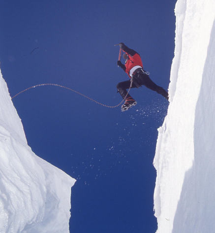 Leap of faith. Similar to jumping a crevasse, our founders took a leap of faith together. We continue to take risks (wisely) like they did. Because if it all worked out for them, what else is possible? Image: MHW Archives