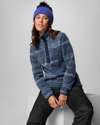 A woman in an outdoor outfit.