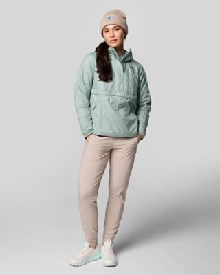 A woman in a stylish Performance Fishing Gear outfit.
